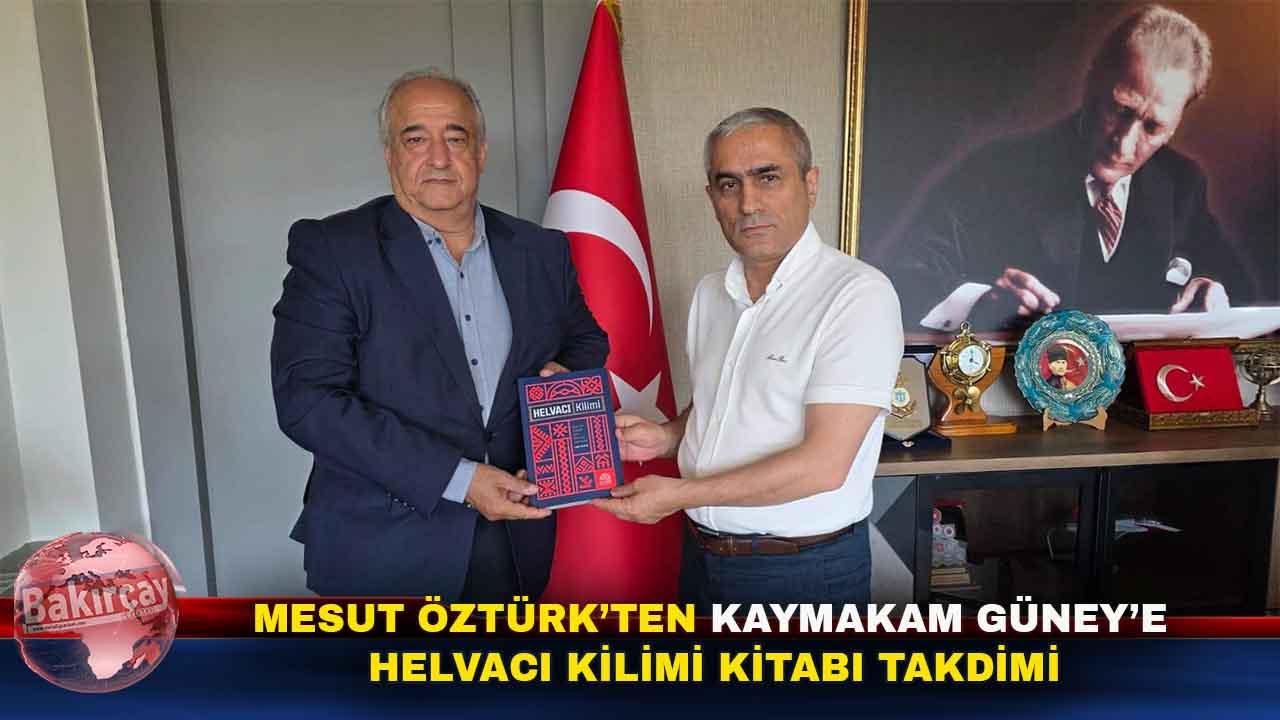 Mesut Öztürk’ten Kaymakam Güney’e Helvacı Kilimi Kitabı Takdimi